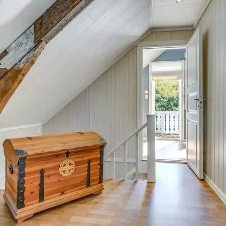Serene Countryside With Fjord Views And Blooming Gardens