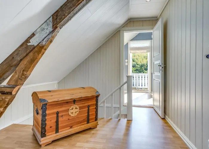 Serene Countryside With Fjord Views And Blooming Gardens