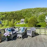 Serene Countryside With Fjord Views And Blooming Gardens Bodø